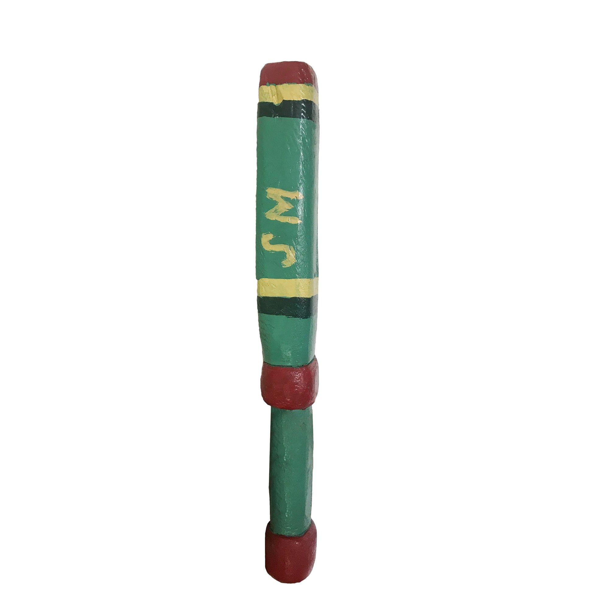 The Dominican clave, showing its painted initials.